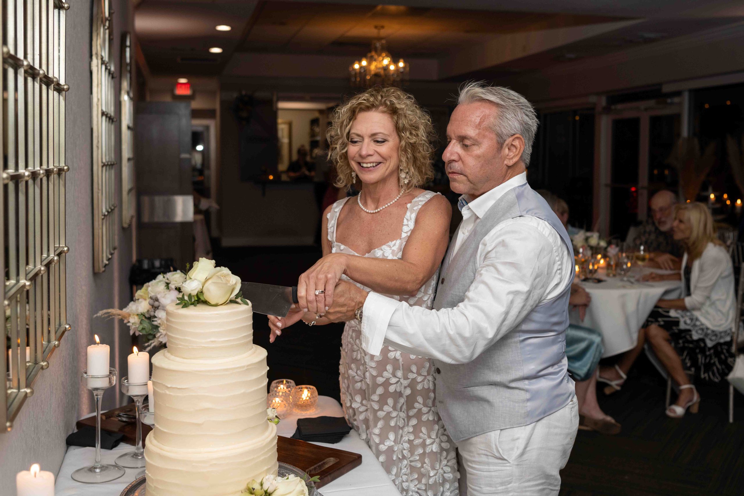 bride and groom get ready to cut their cake