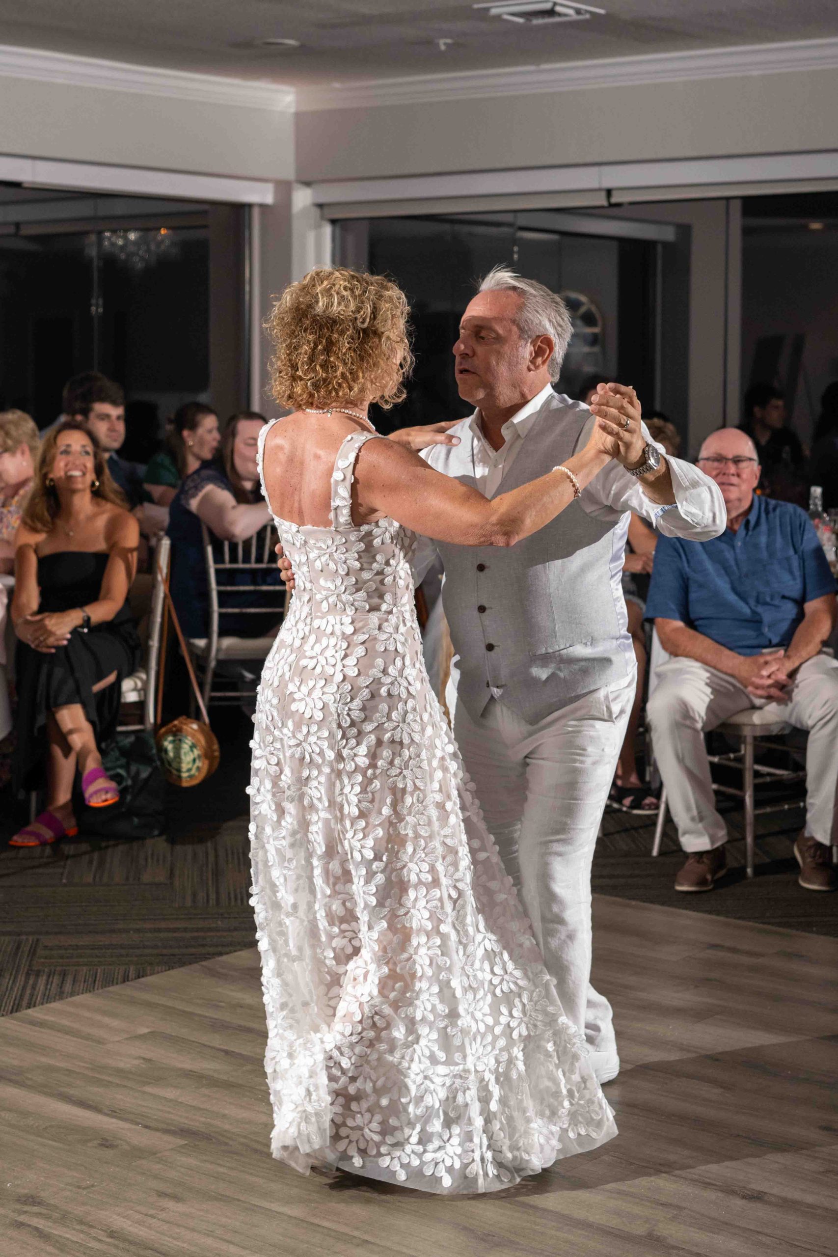 couple dance closely during wedding reception at The Waverly