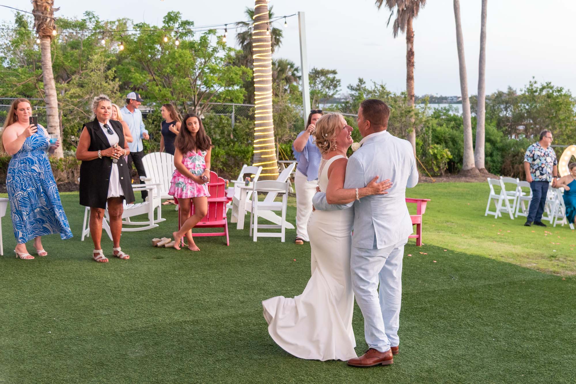 bride and groom share first dance on the lawn after wedding at The Point