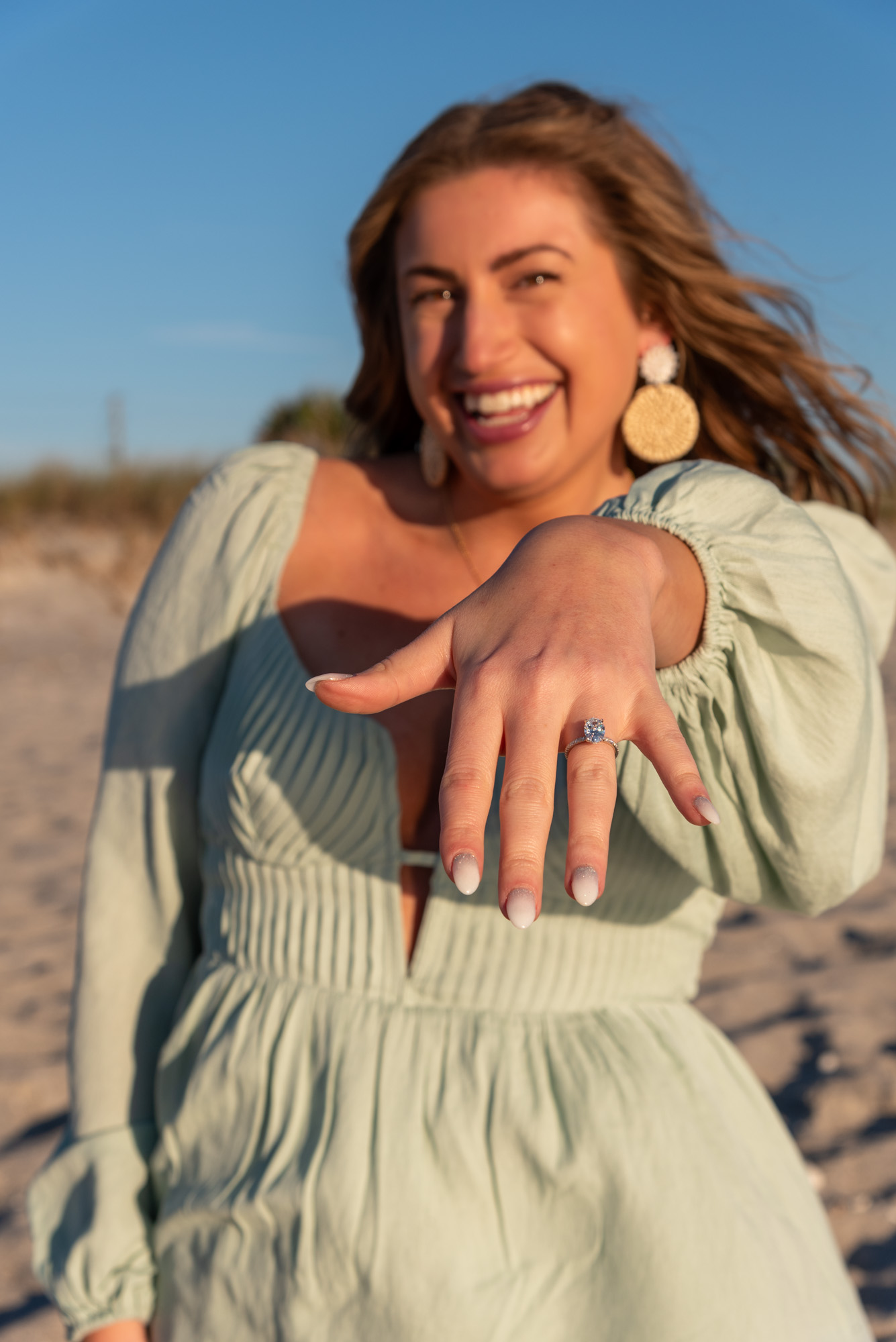 girl shows off her new engagement ring