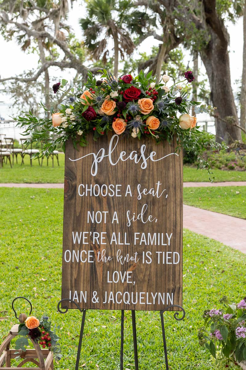 wedding sign directing guests where to sit