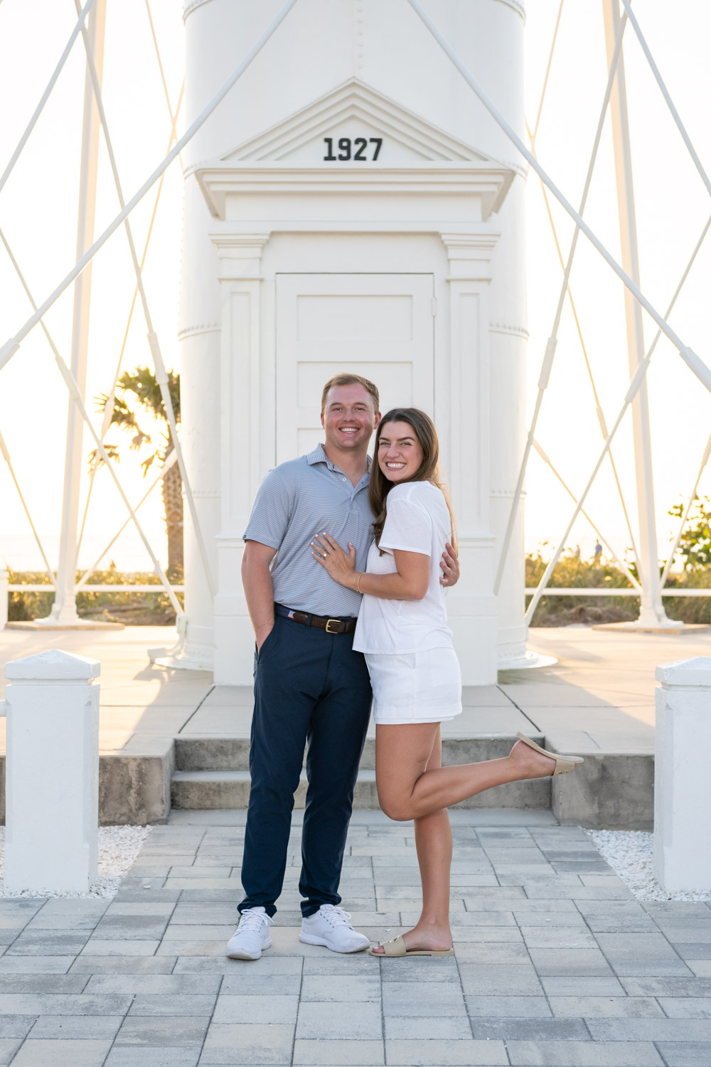 engagement photo of couple in front of the lighthouse on Boca Grande