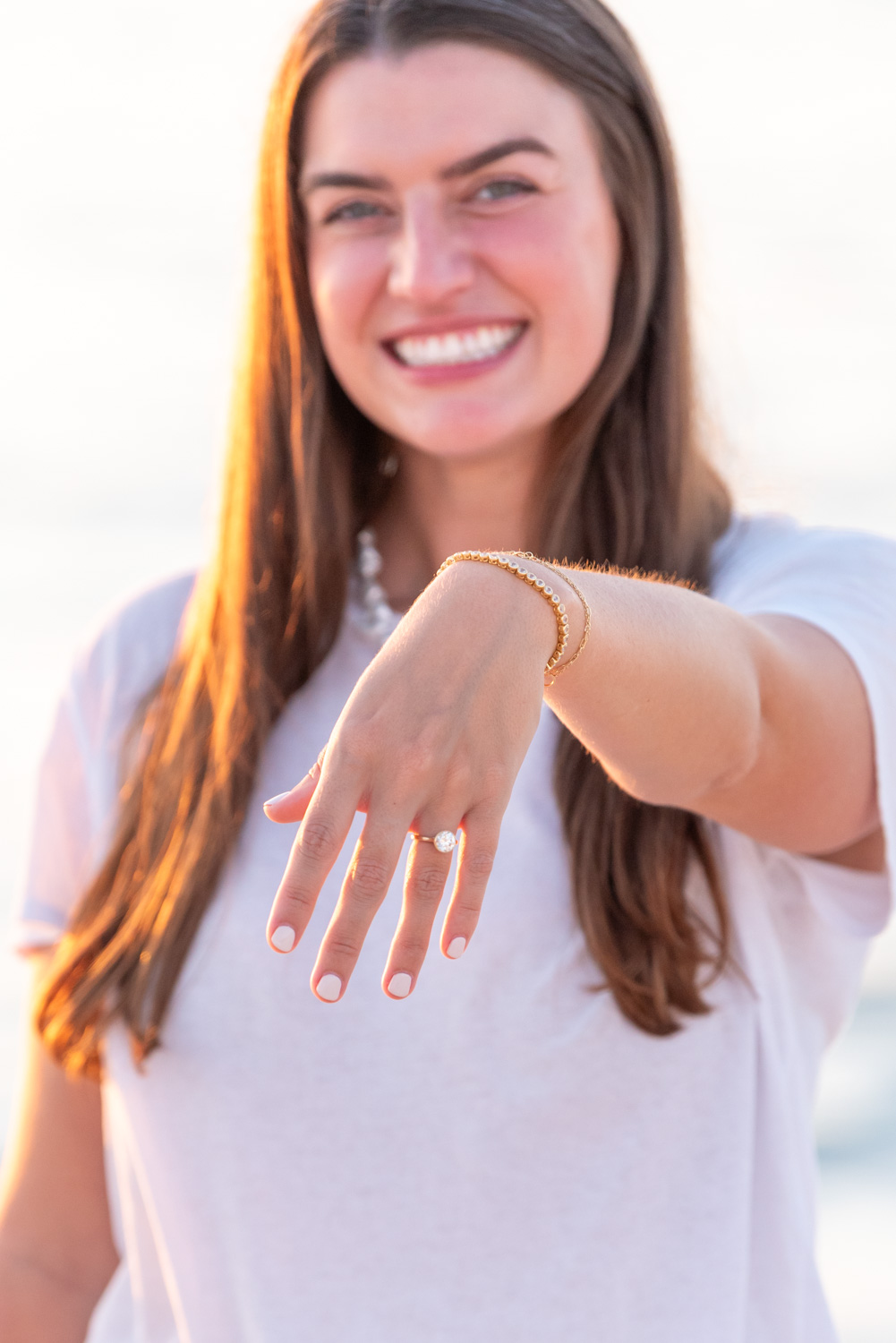 girl shows off her engagement ring