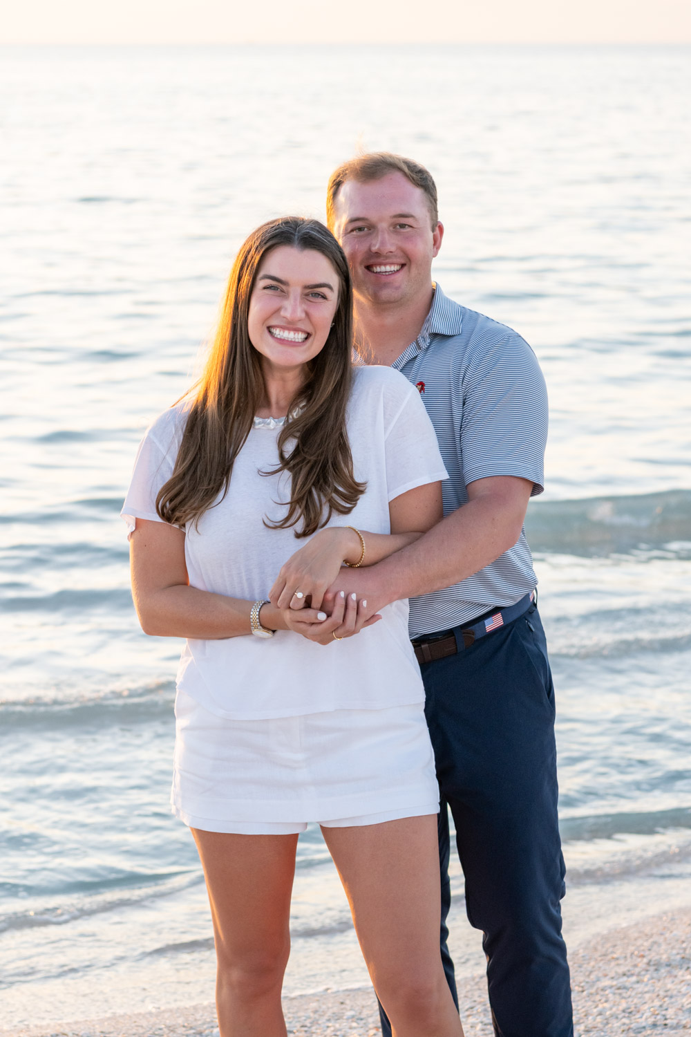 loving photo of couple on the beach