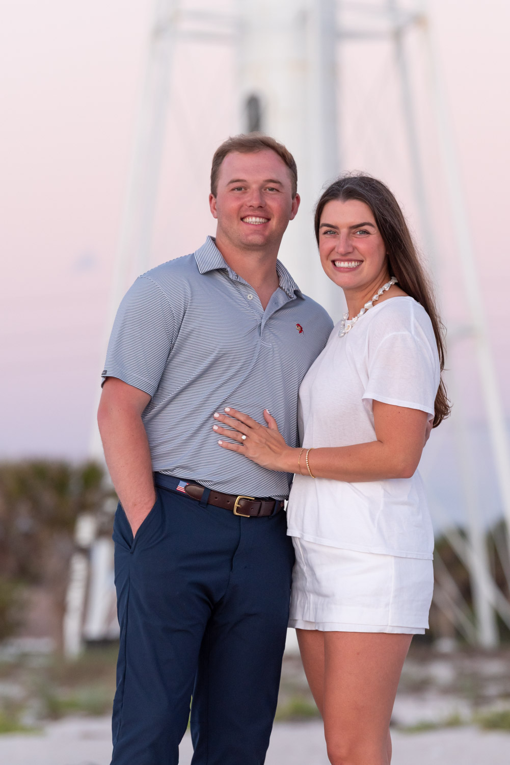 young couple in front of lighthouse on Boca Grande