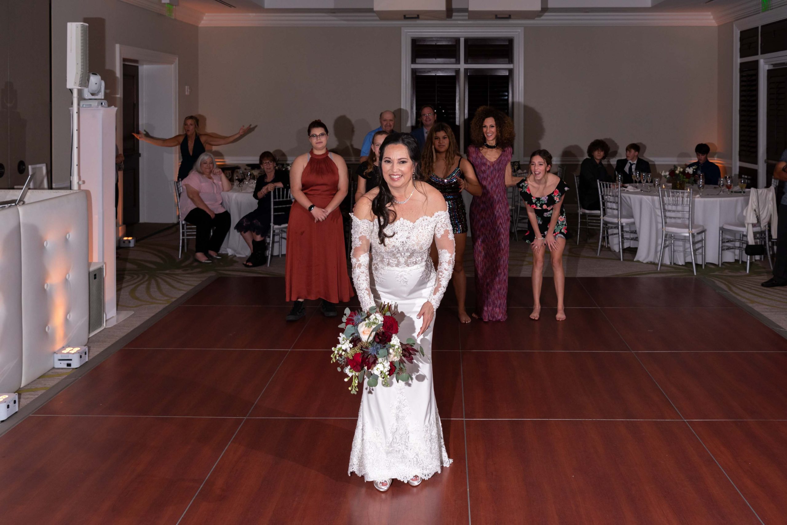bride gets ready to toss her bouquet