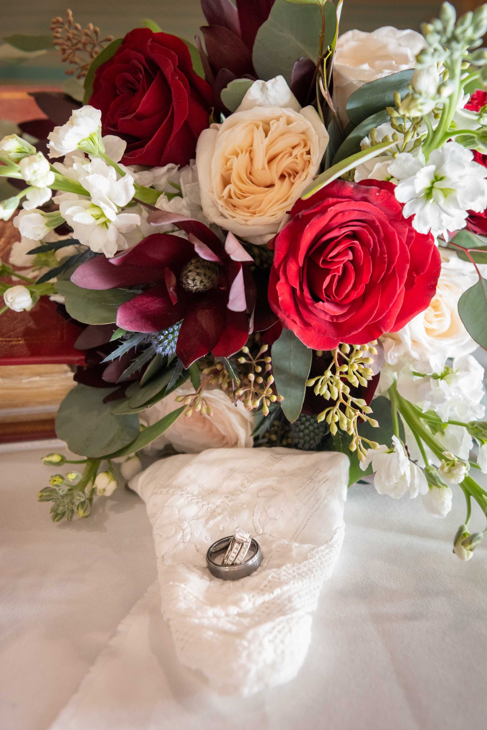 bridal bouquet with wedding rings