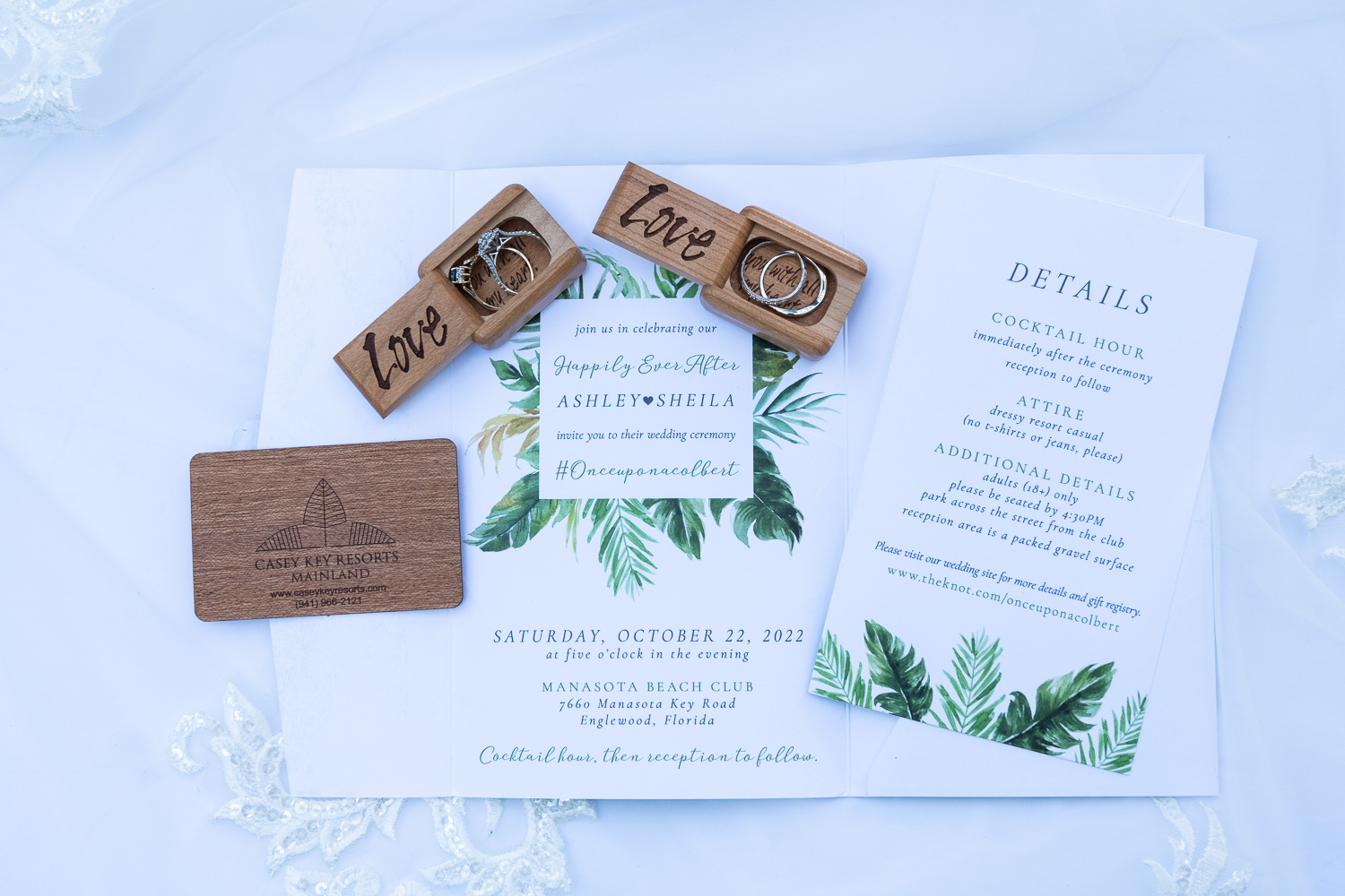 rings and wedding invitations on display