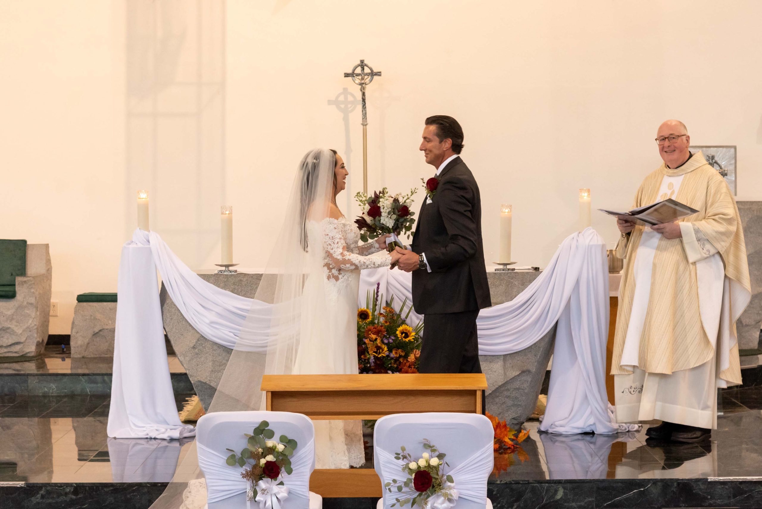 bride and groom at church altar
