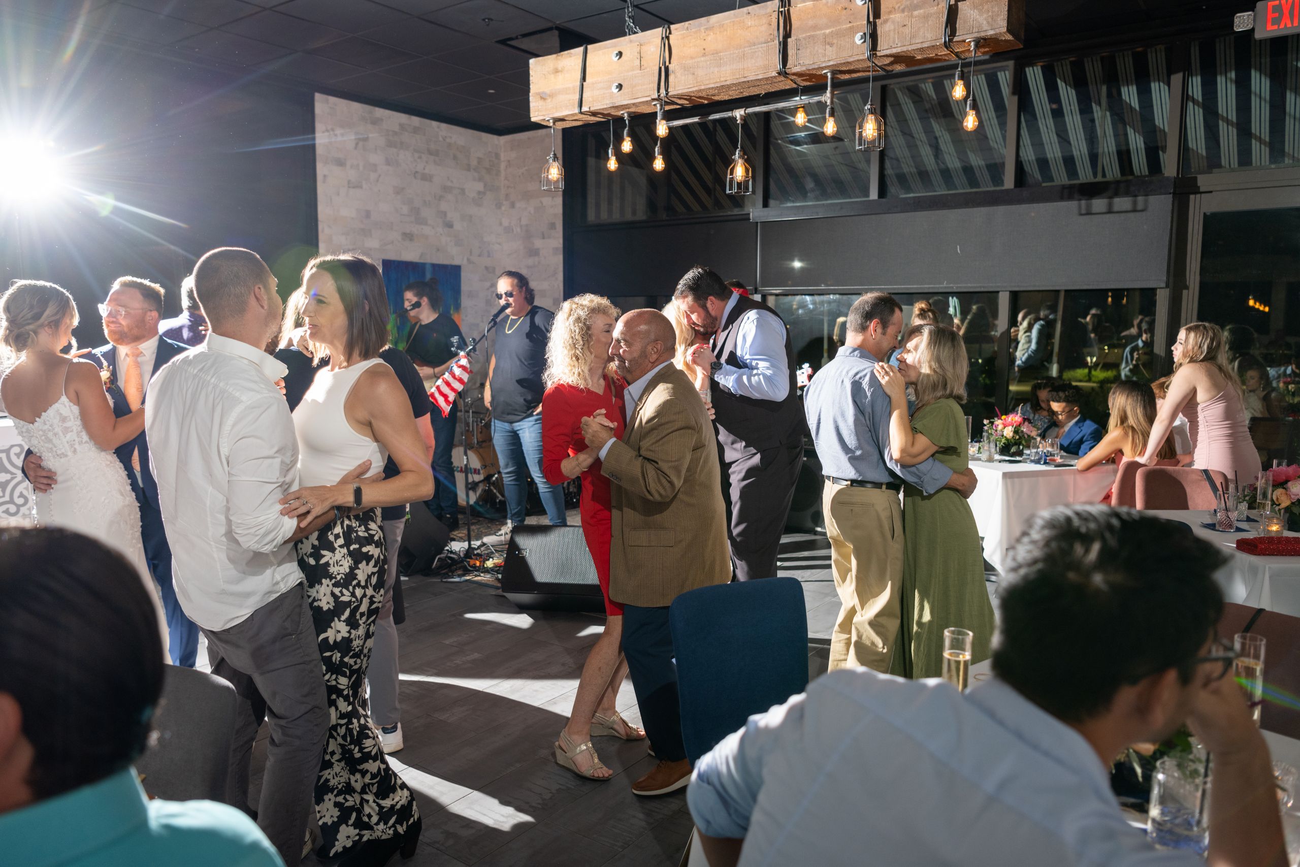 people dancing at the wedding reception