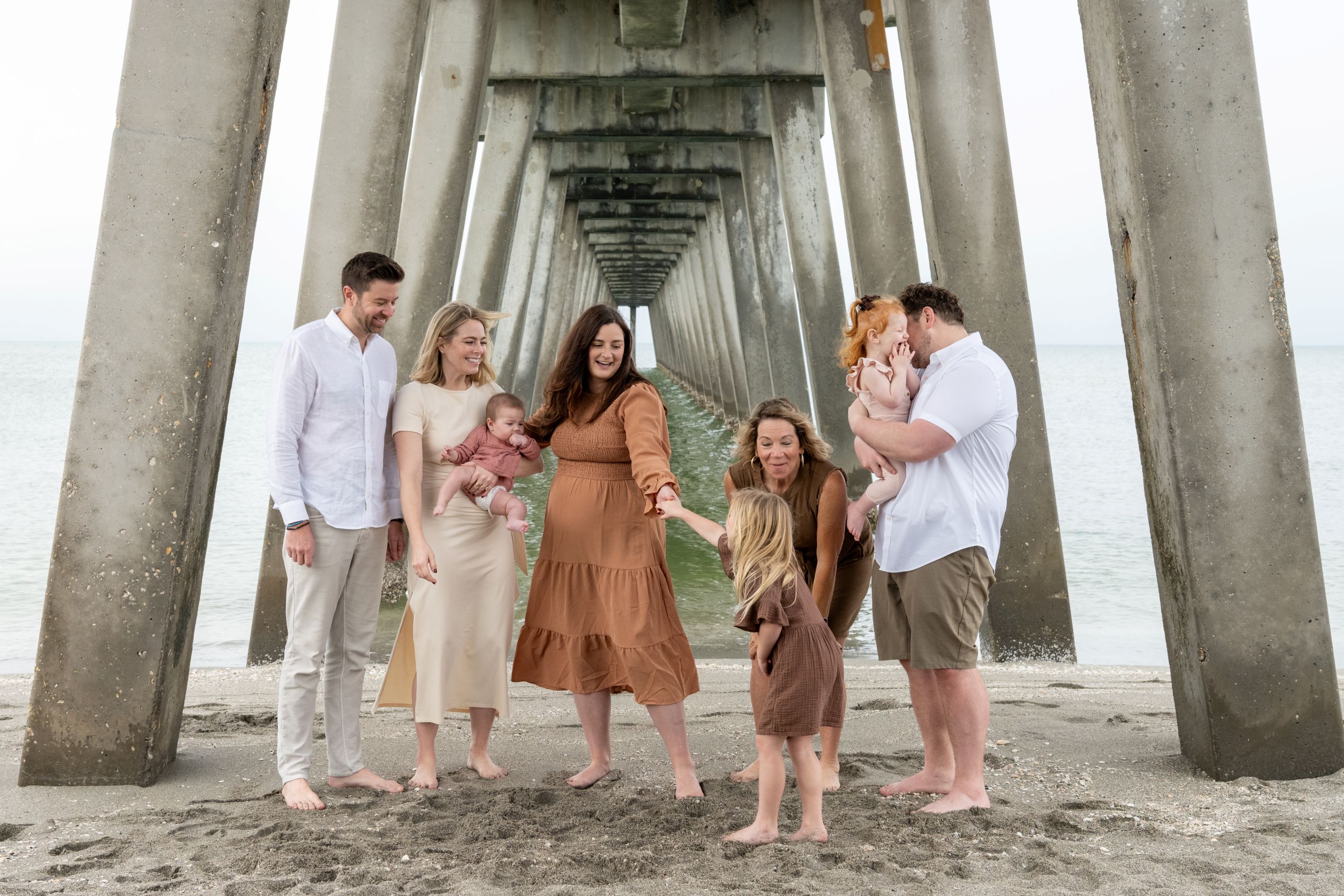 family under pier