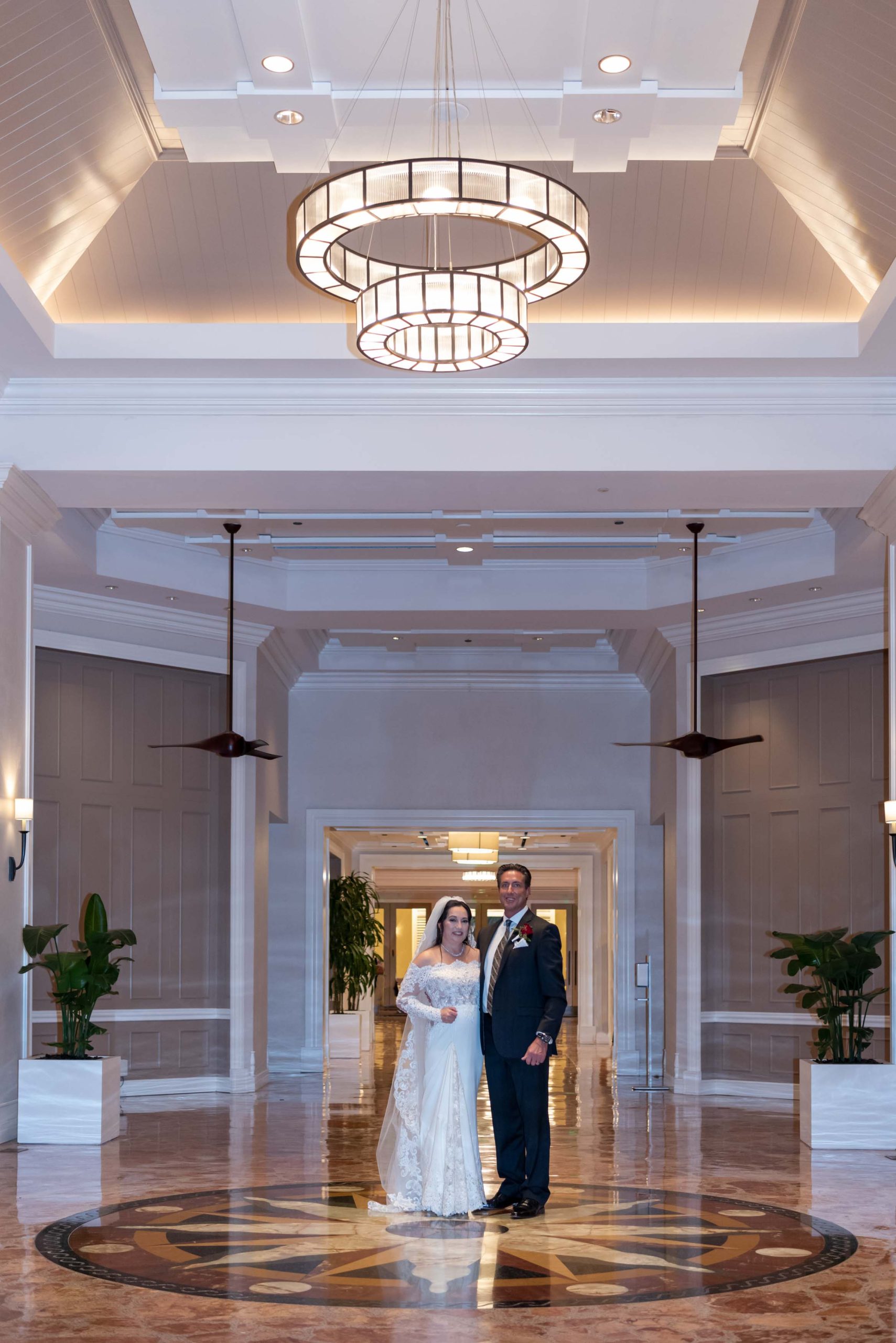 bride and groom inside lobby