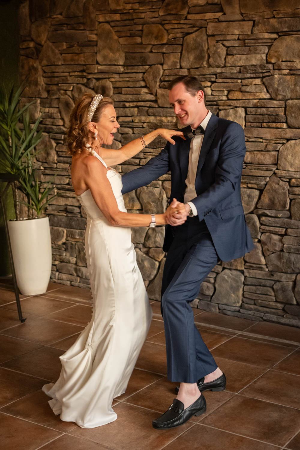 bride dances with her son during wedding reception at Sage SRQ