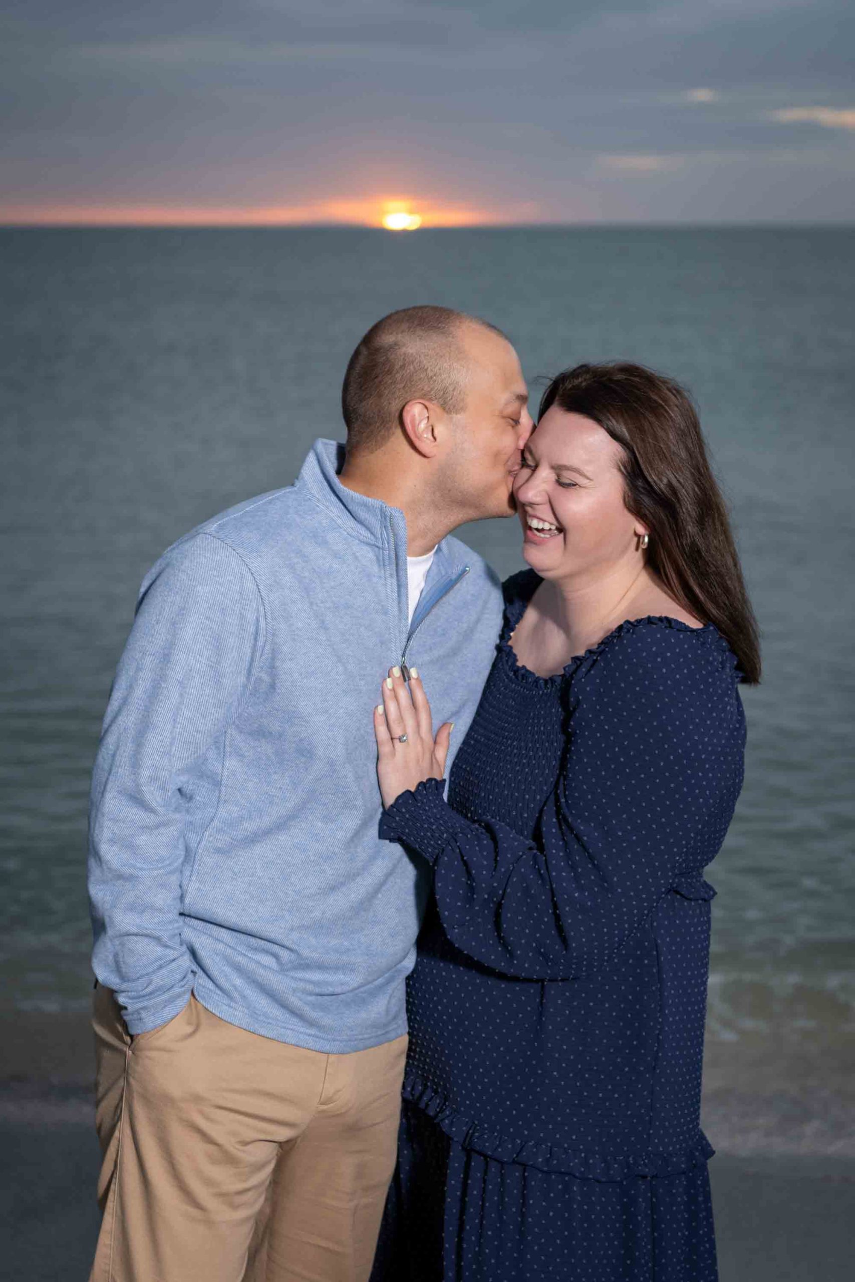 guy kisses his girlfriends cheek