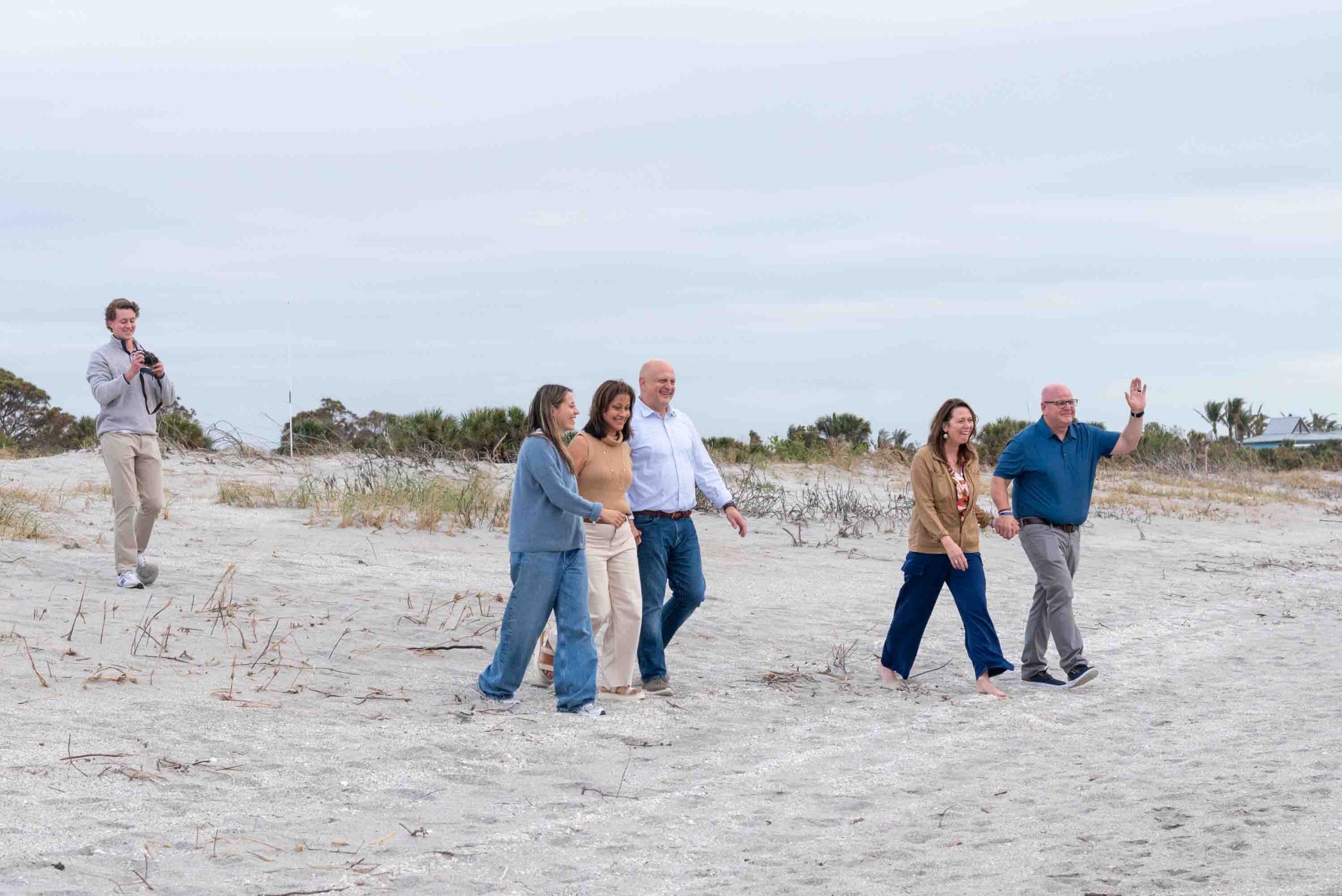 the couple's families approach them as a surprise