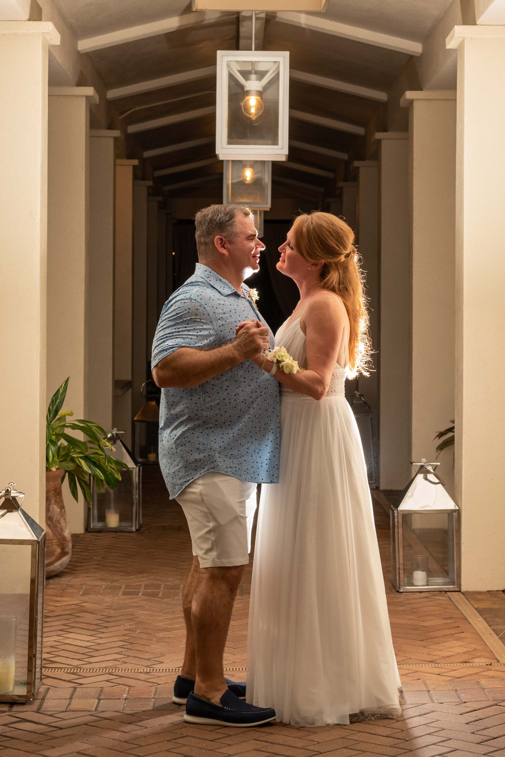 couple dance in foyer of LaPlaya Beach and Golf Resort