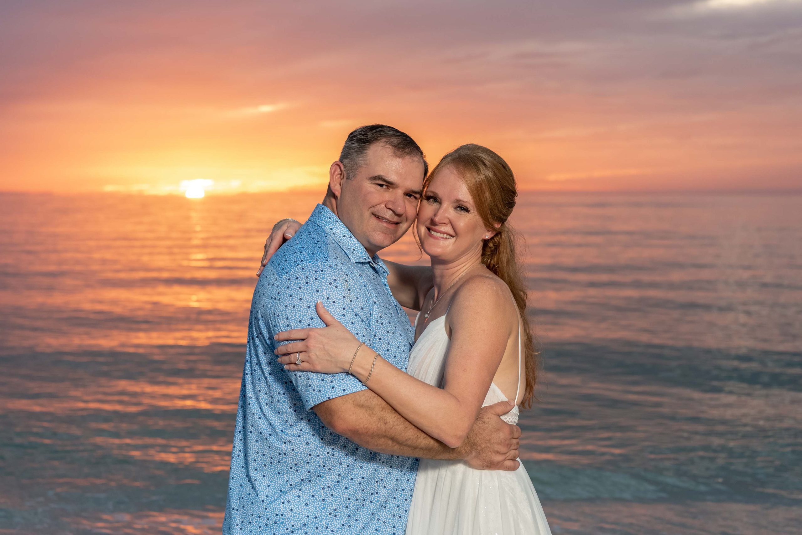 bride and groom at sunset