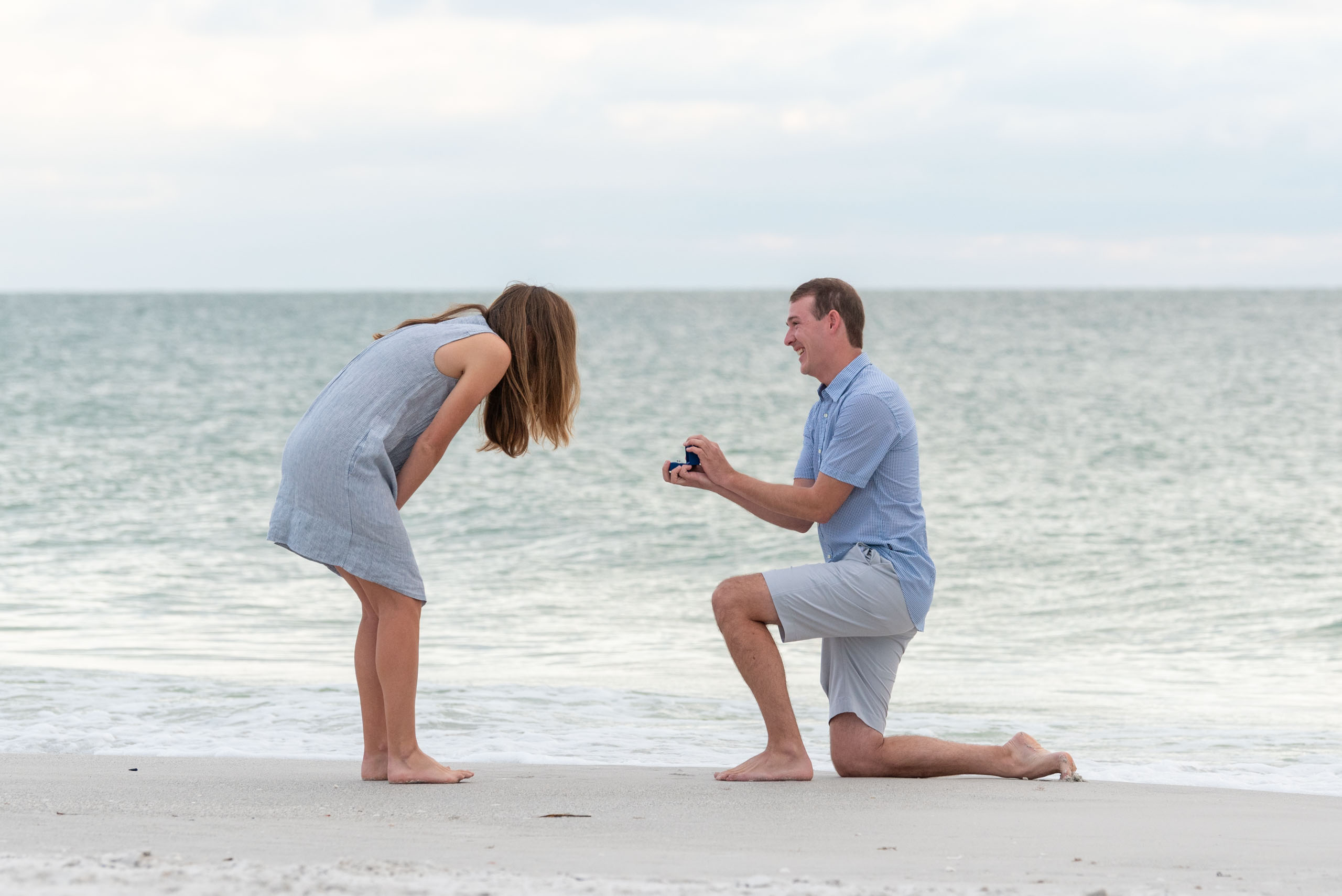 Lido Beach engagement session with guy proposing to his girlfriend on Lido Beach