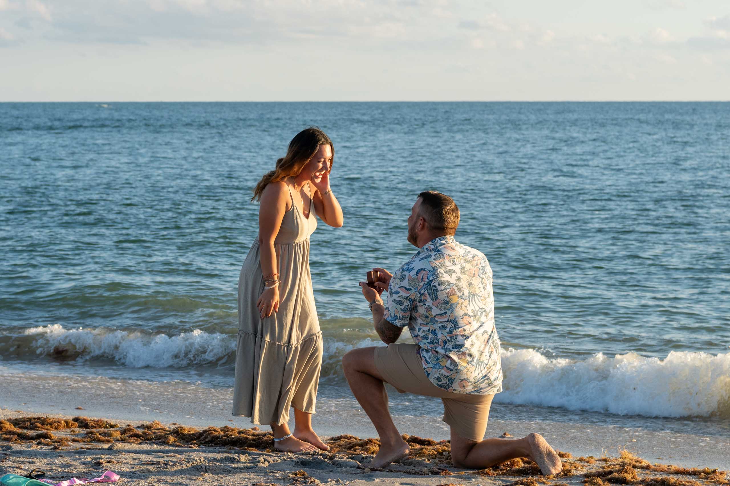 surprise proposal on Stump Pass Beach in Englewood