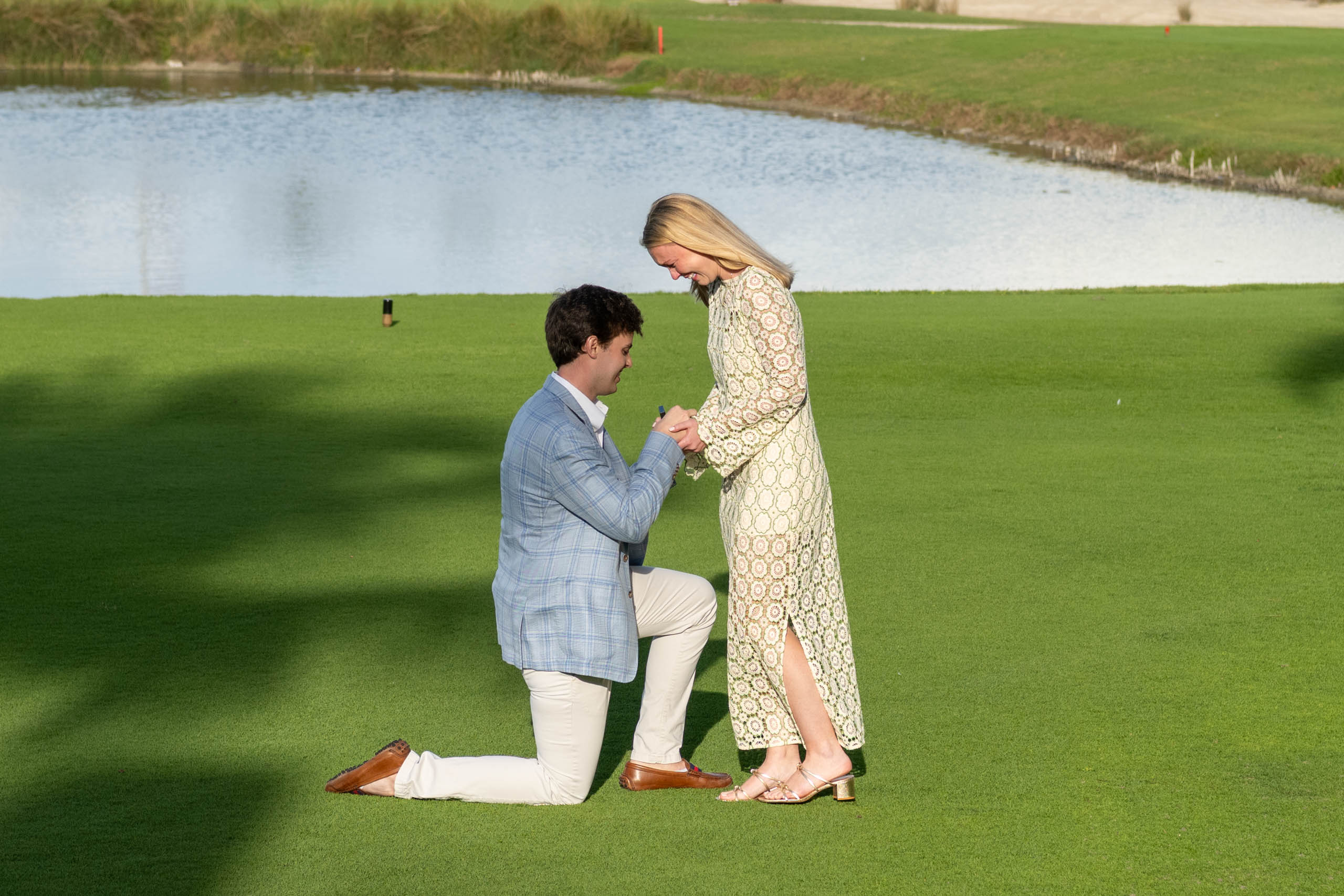 woman in shock as her boyfriend proposes at the Gasparilla Inn