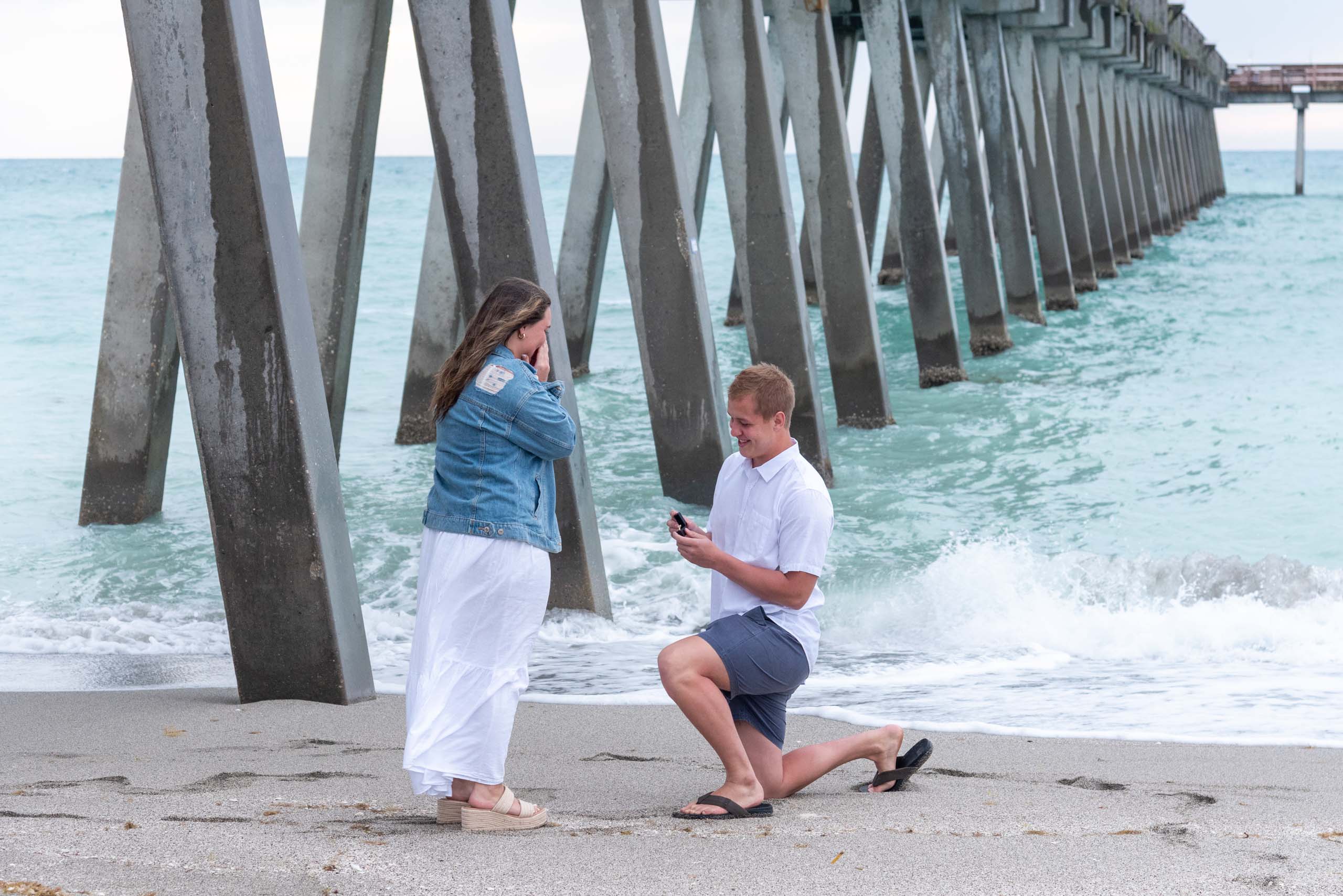 luke gets down on his knee to propose to his girlfriend