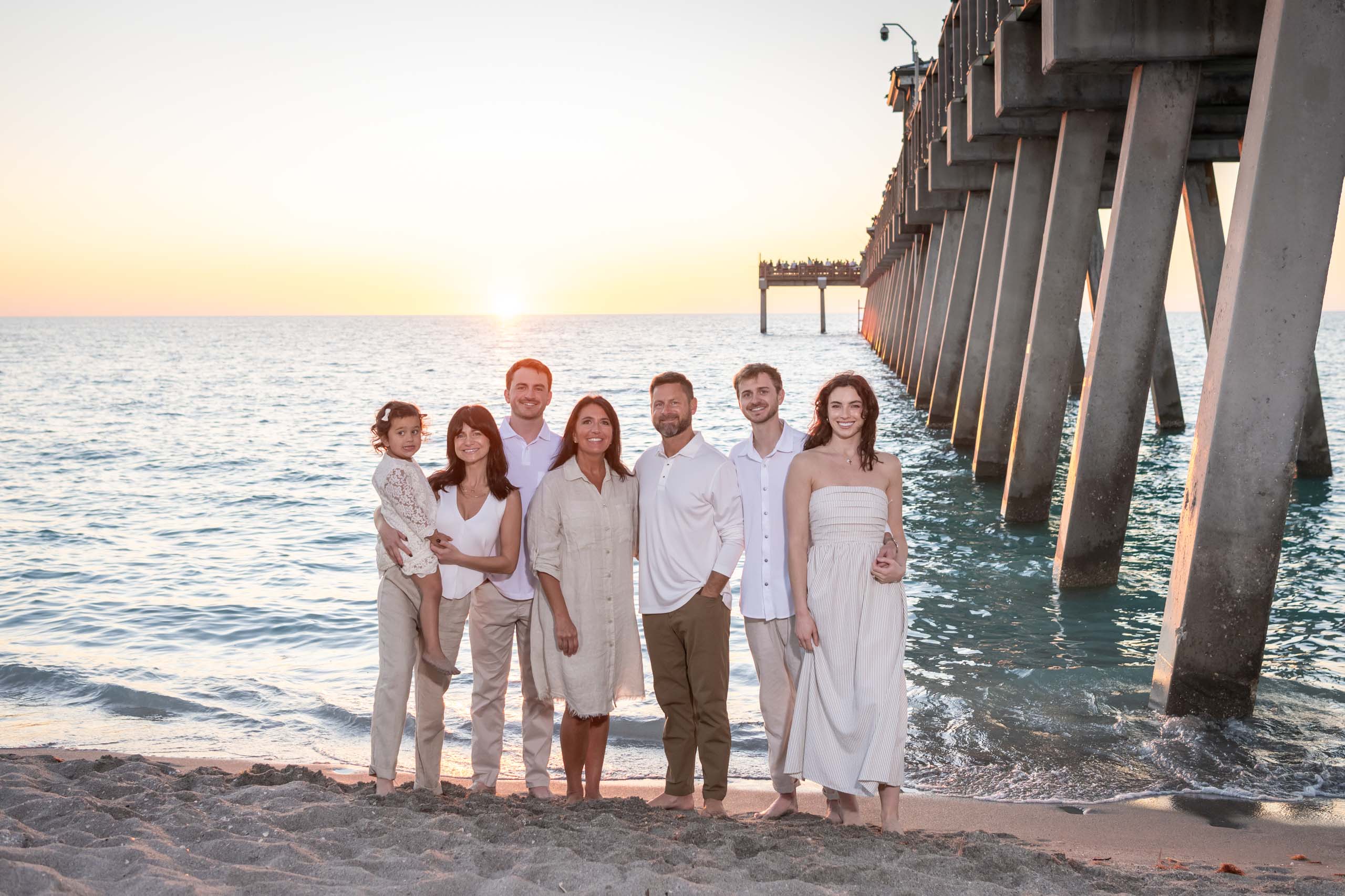 family together at sunset at the Venice Fishing Pier