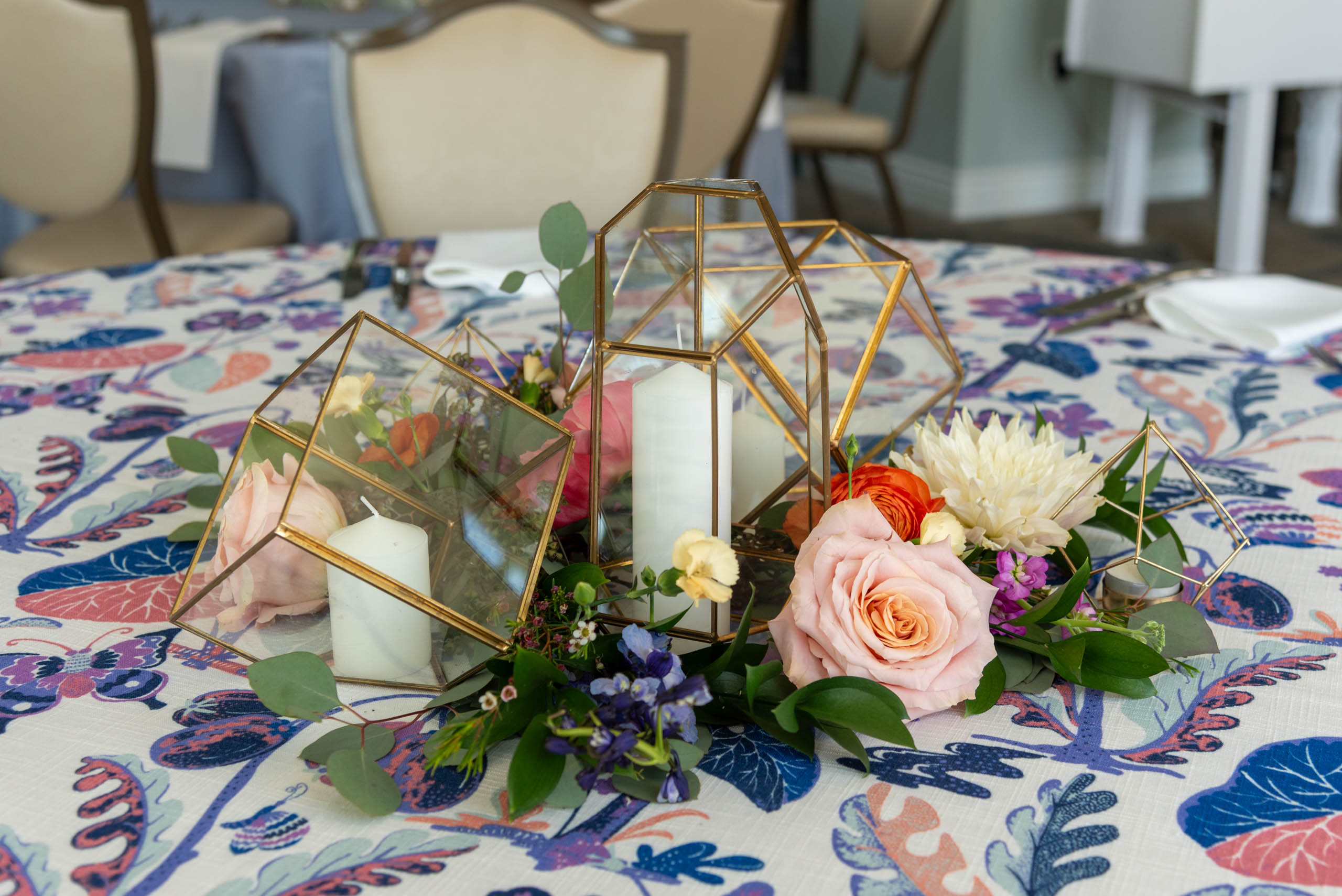 glowers and candles on the tables before wedding at Fenway Hotel Dunedin