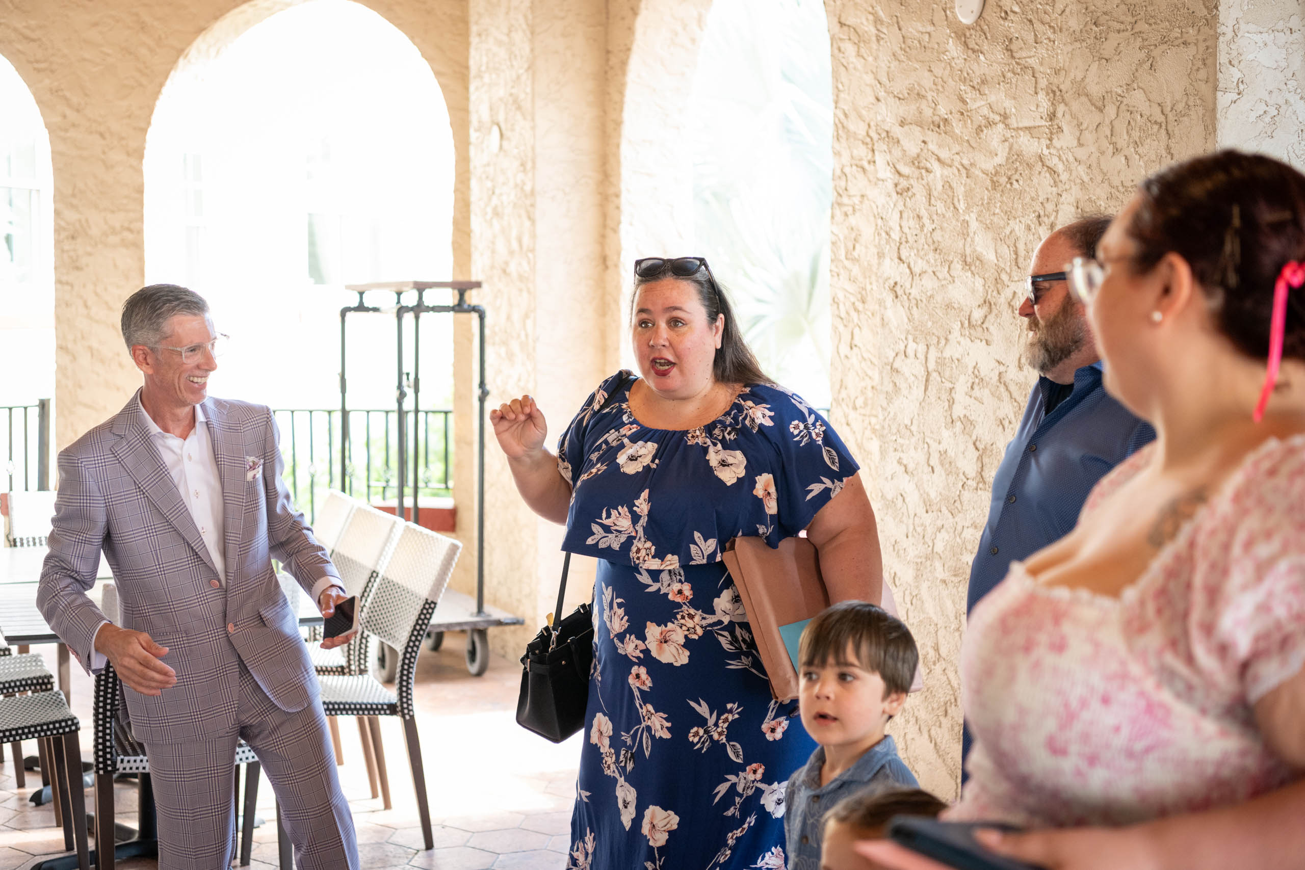 groom greets the guests at the Fenway Hotel before the wedding