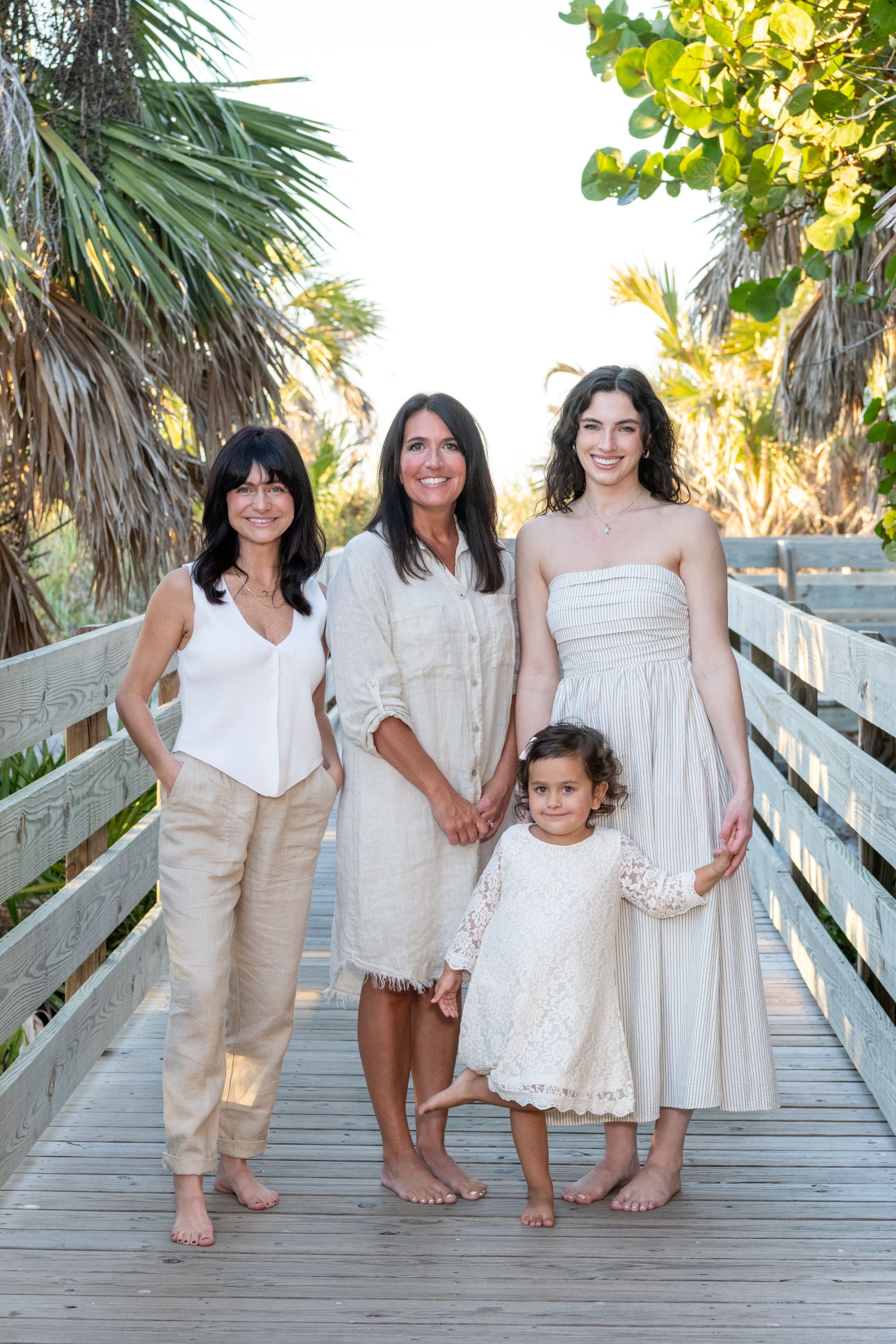 three generations of woman stand together