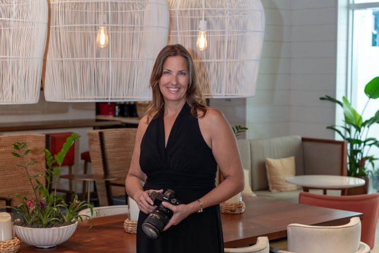 wedding photographer, Stephaie Snow with a camera