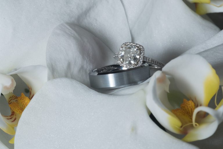wedding ring in a white flower