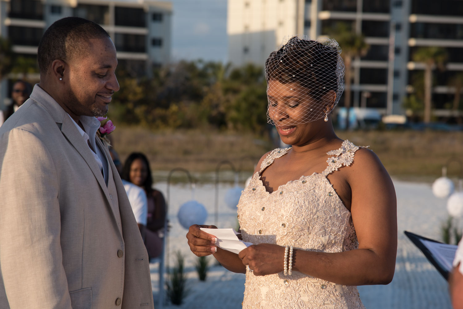 bride reads her wedding vows