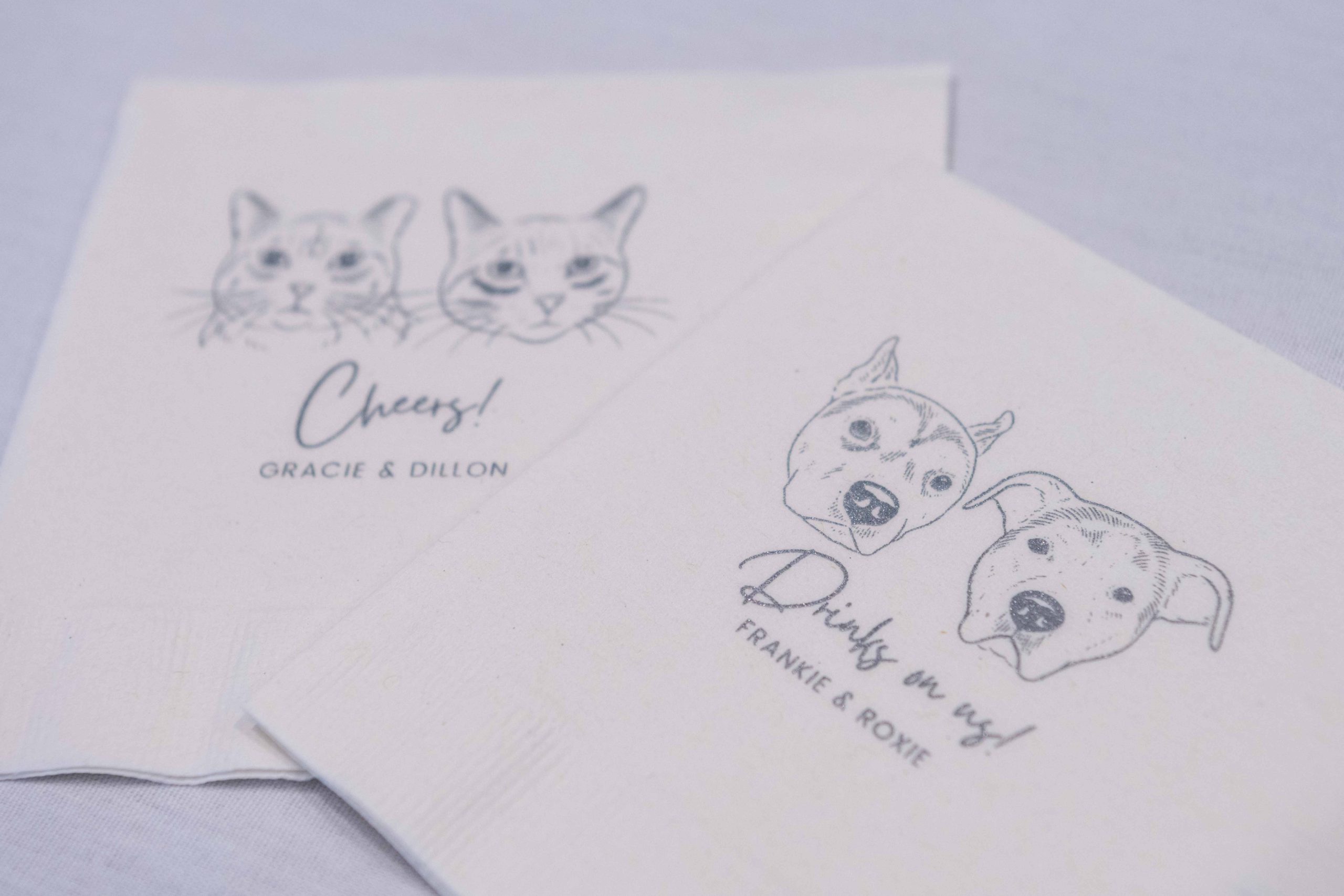 napkins featuring their dog and cat