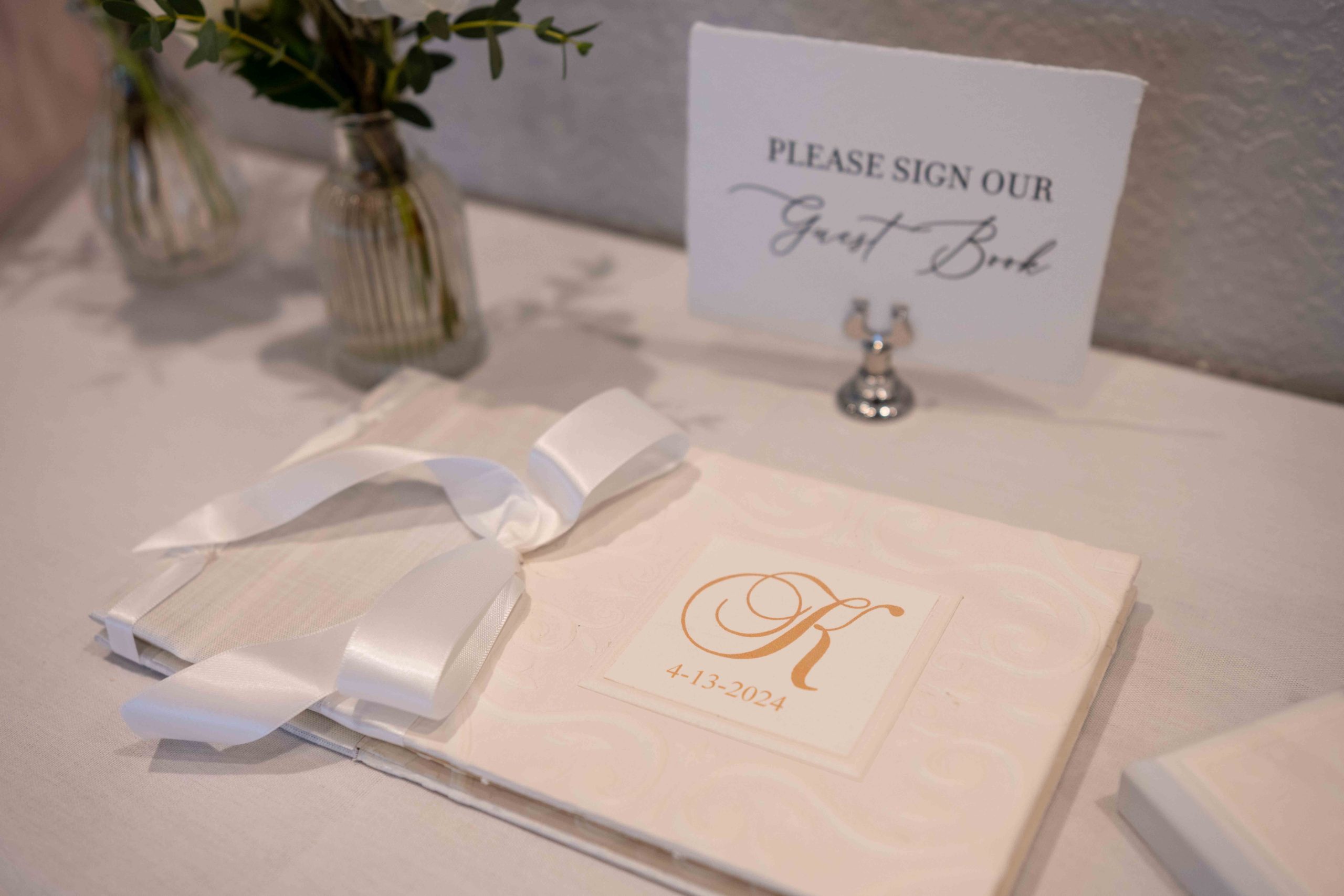 gift table at the reception featuring the signature book