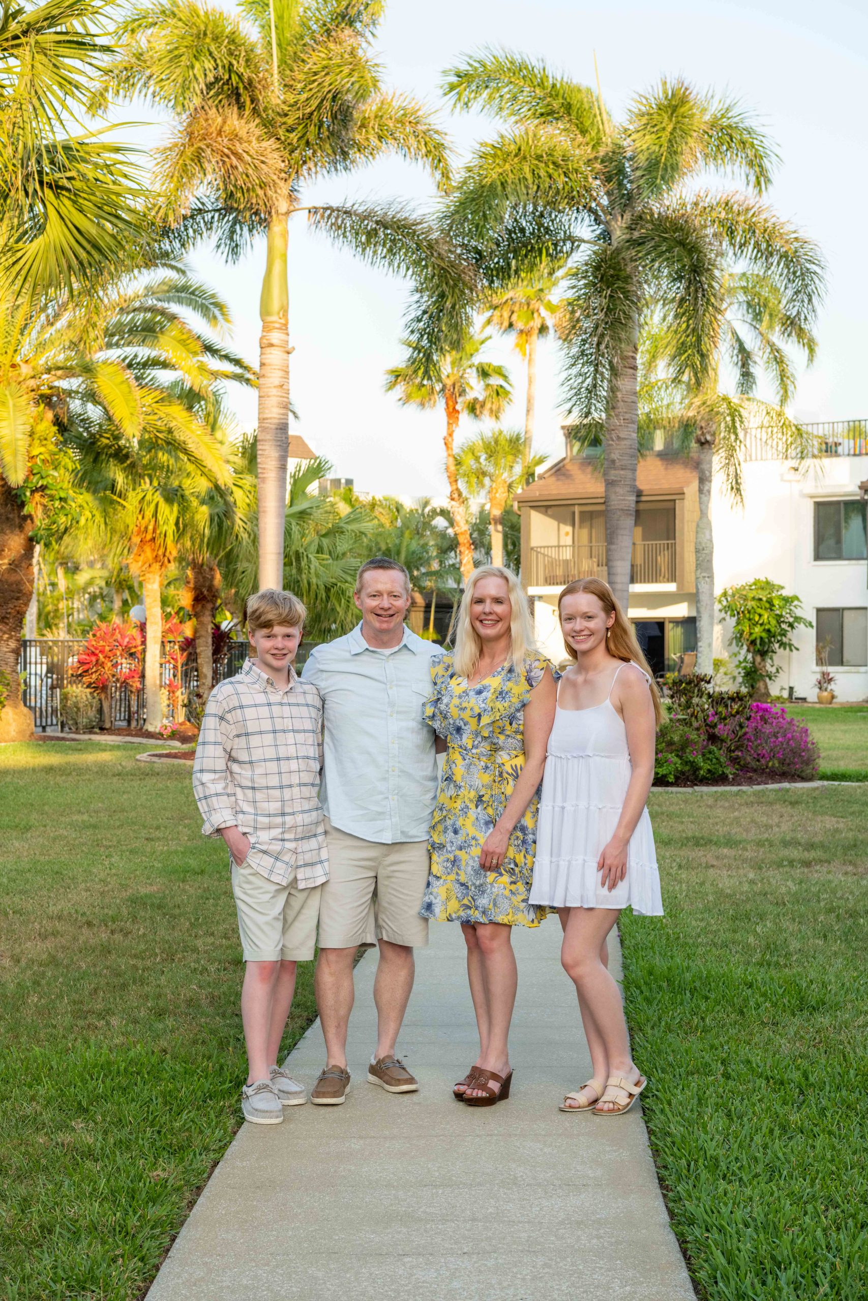 family together on sidewalk at Tamarind Inn