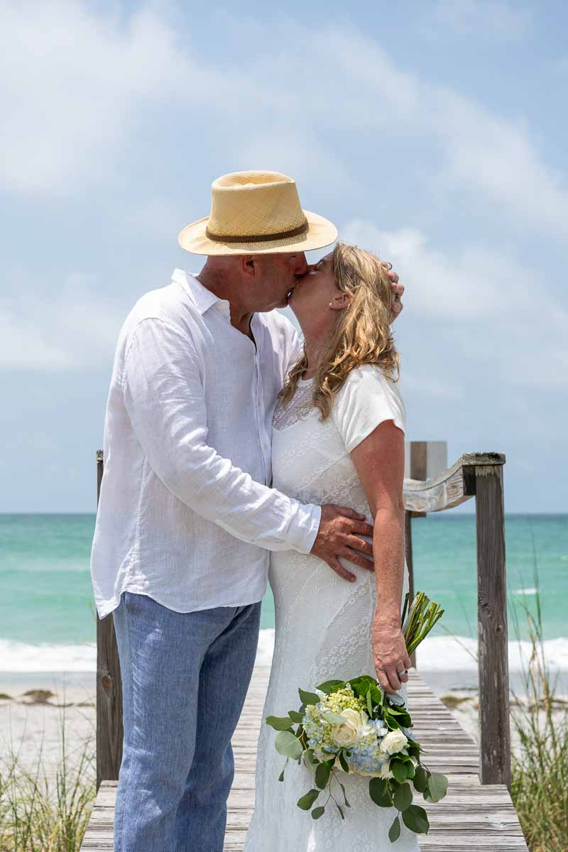 bride and groom kiss
