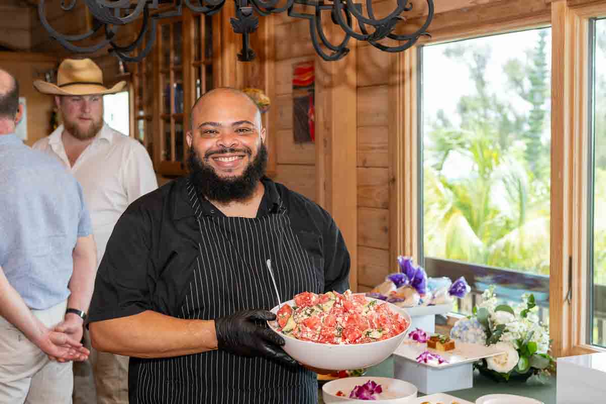 Chef Alain Lemaire holding a dish