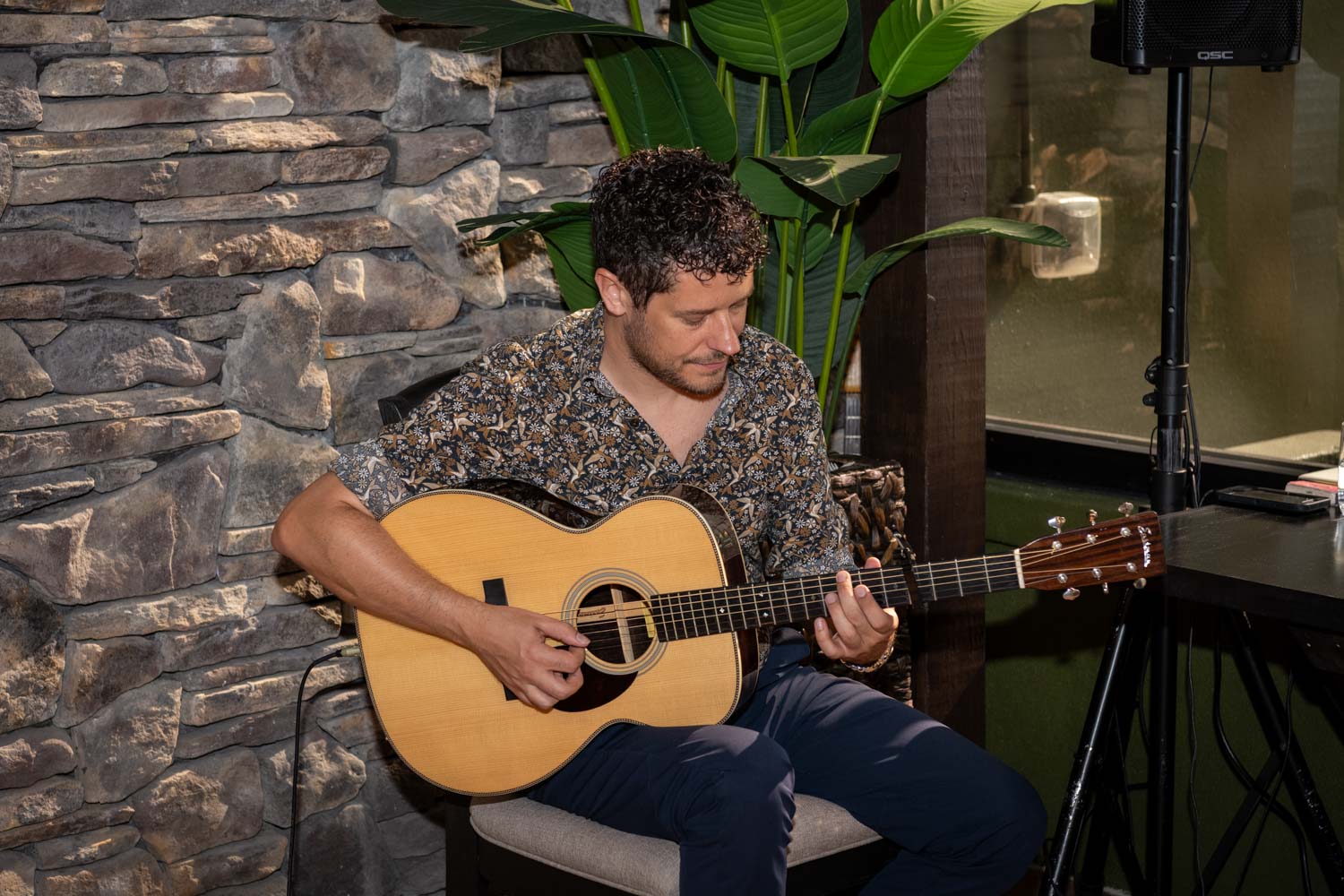 the guitarist plays music