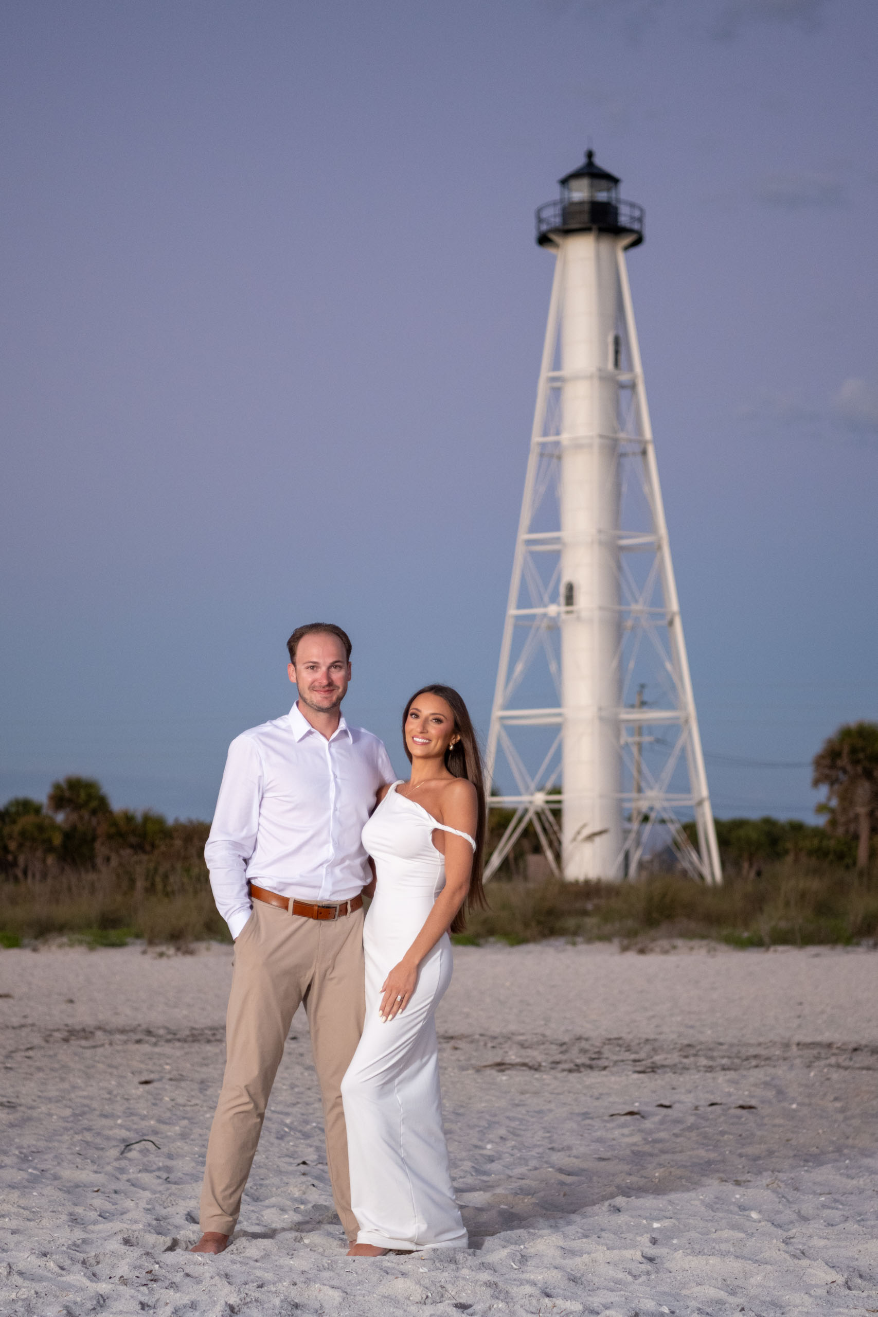 couple by the lighthouse on Boca Grande just after the sunset