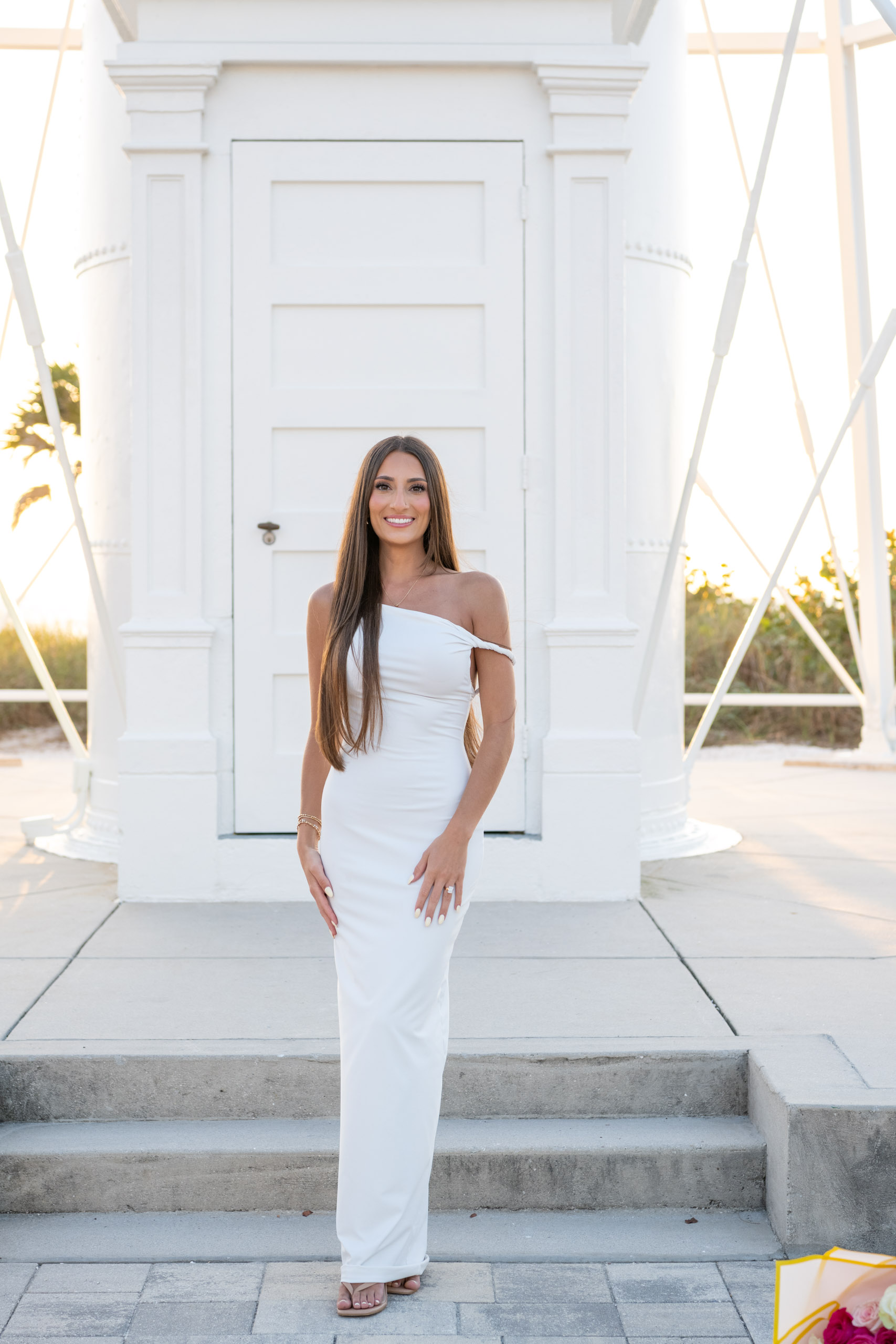 beautiful woman in front of the lighthouse