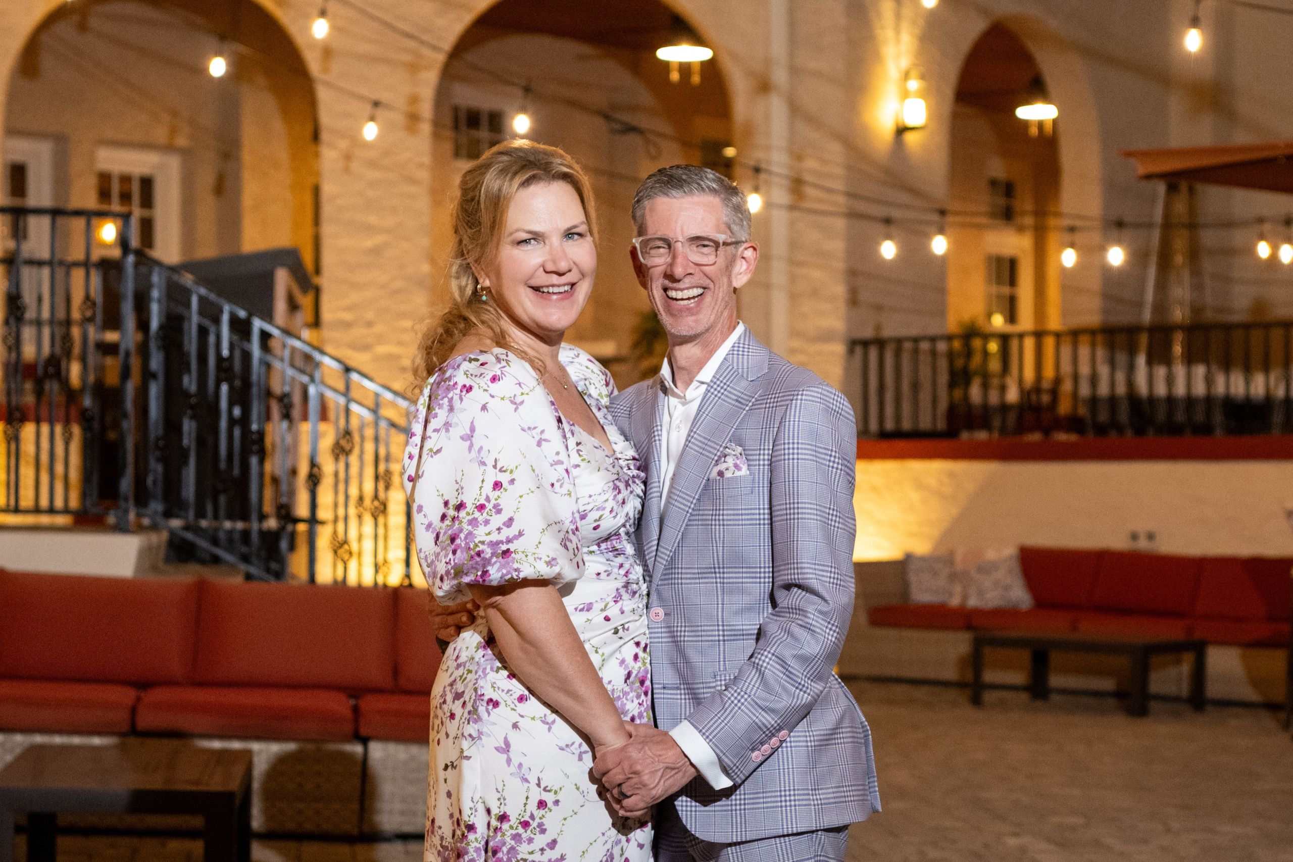 newly married couple in the courtyard of the Fenway Hotel in Dunedin