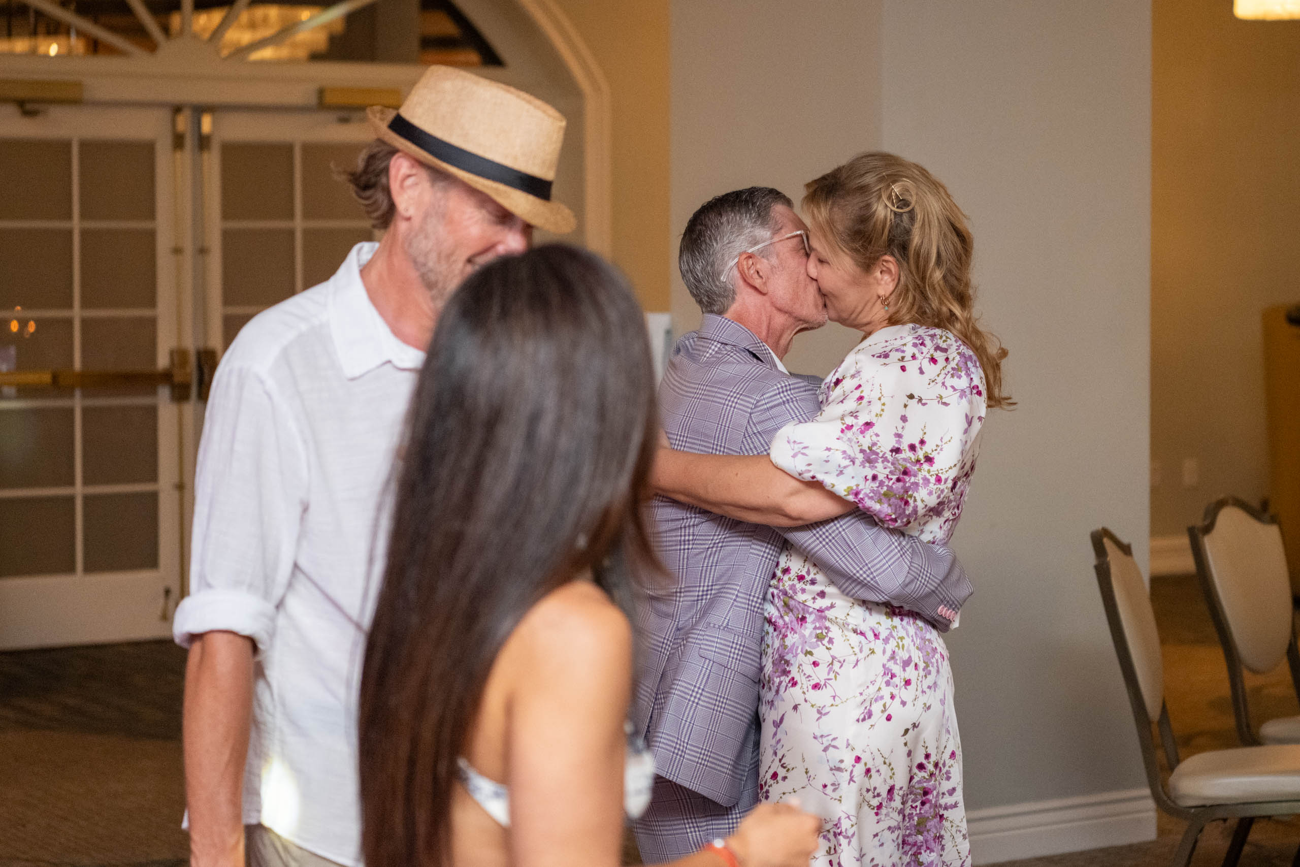 bride and groom kiss during reception at Fenway Hotel Dunedin Florida